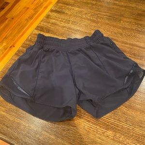 Lululemon hotty hot- 2 tall, navy shorts.